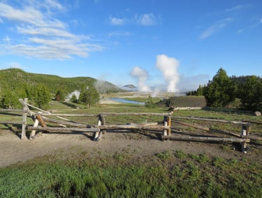 Over the Fence; geysers and a fence in Yellowstone N.P.