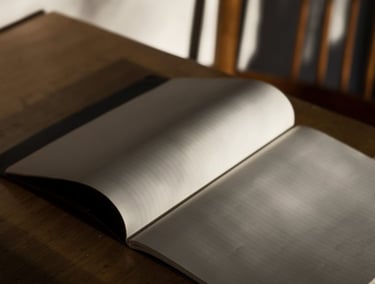 An open book on a desk representing academic study