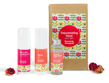 Rejuvenating rose gift set with skincare products, floral packaging and dried roses