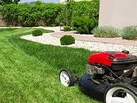 lawn mower on green grass