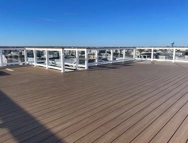 Custom framed floating rooftop decking over top of fiberglass.