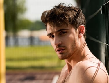 a sugar baby with a shirtless shirt on a baseball field