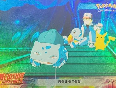 31 Reunited! Topps Pokémon The First Movie rainbow foil