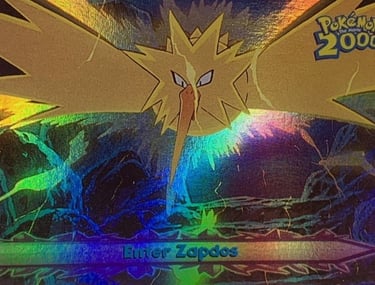 33 Enter Zapdos Topps Pokémon The Movie 2000 rainbow foil