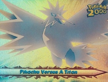 34 Pikachu Versus A Titan Topps Pokémon The Movie 2000 rainbow foil