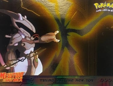 7 Trying Out The New Toy Topps Pokémon The First Movie silver foil