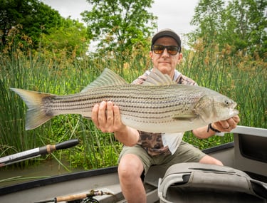 Eric loved catching stripers on the fly.