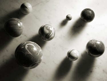 black and white image of marble spheres on a marble background