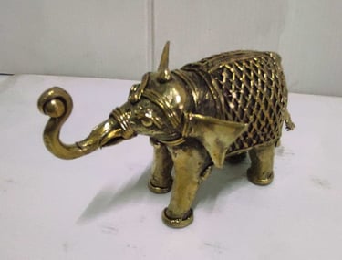 "Small brass elephant with raised trunk and intricate tribal design carvings-For international dispatch"