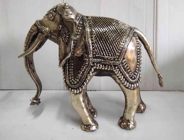 "Tribal-style designer brass elephant with fine detailing, left view-Prepared for export"