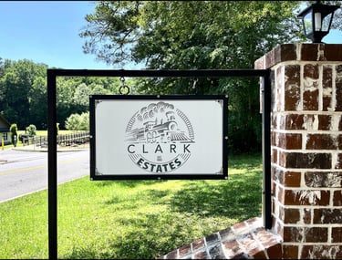 a metal sign that is for a business