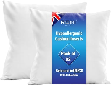 a pair of pillows with a white pillow and a blue and white pillow