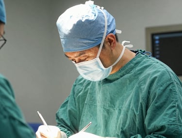 Sleek laptop displaying a clean, modern website layout with blue and white accents.