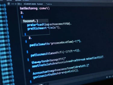 A dark-mode terminal screen with glowing neon blue lines of code and a central command prompt, shot from a slight angle.
