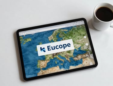 An overhead shot of a clean workspace with a tablet and a coffee, representing the balance of professional life and digital innovation in Europe.