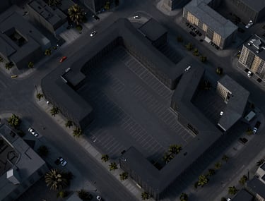 A minimalist site plan drawing showing parking and buildings in shades of black and dark gray, professional urbanization document.