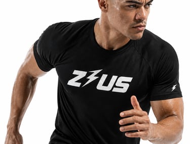 Athlete sprinting in black Zeus sweat-wicking gym shirt for intense training in NZ.