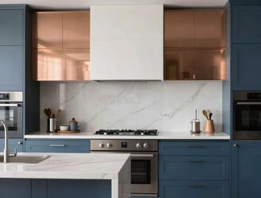 High-quality architectural photo of a modern kitchen with a clean drywall bulkhead over the island. Steel blue cabinetry, warm copper accents.