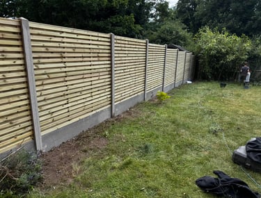 Wooden fence panels and concrete posts in Worcester