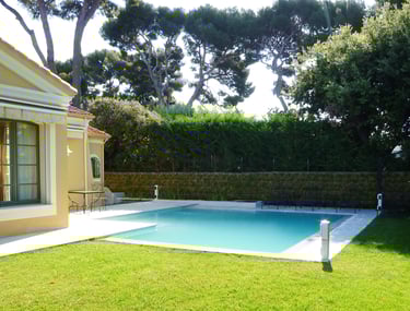 Luxury outdoor swimming pool integrated into a renovated property