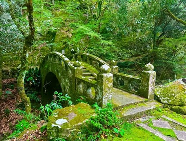 Taki no Kannon statue beside a small waterfall in Nagasaki