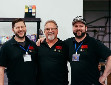 Rob's Mods team standing proudly together at their booth as sponsors of the event.