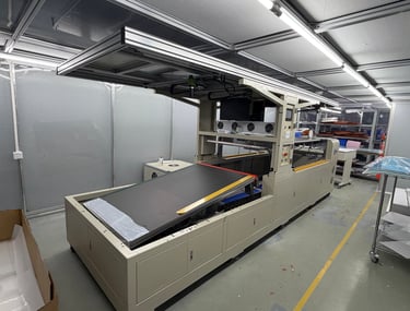 ClaraTech automated large-format optical bonding machine in Class 1000 clean room.