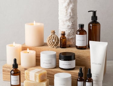 Close-up of hands applying a gentle facial treatment with natural products.