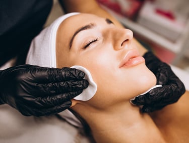 a woman getting a facial lift in a beauty salon