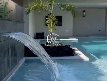 Dekorasi kolam hias untuk mempercantik halaman rumah lengkap dengan air tirai.