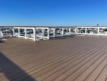 Custom framed floating rooftop decking over top of fiberglass.
