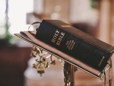 Holy Bible on pulpit in church—Christian faith, Scripture, worship service