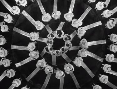 Busby Berkeley’s 42nd Street number “I’m Young and Healthy” – overhead view of dancers shaping swirl