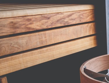 Cedar sauna bench with premium craftsmanship and smooth wood grain in an Outdoor sauna Ontario