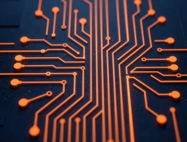 Stylized view of a digital circuit pattern glowing with orange light against a deep navy blue background, tech-forward, modern.