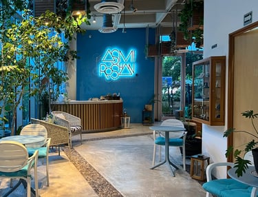 a restaurant with a neon sign that says,'a neon sign that says a