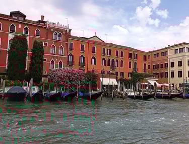 a group of boats on a Canale Grande  in Venice
