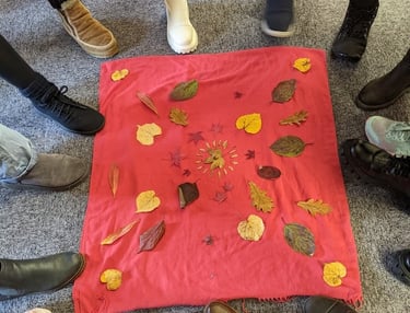 feet around mandala of leaves