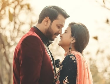 a couple standing next to each other in a tree