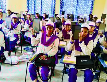 Students of EduExl showing their tablets