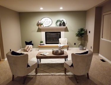 a living room with a fireplace