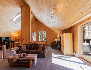 a family room with a couch
