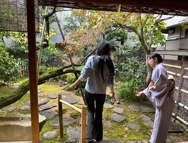 Traditional Japanese garden with trees, stones, and a calm atmosphere
