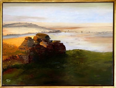 Oil painting of a misty sunrise over rocky tors and hills in a golden landscape.