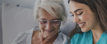 Home care personnel with elderly lady