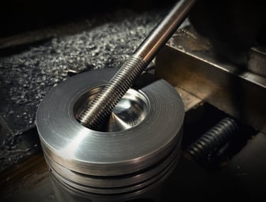 a machine is turning a cylinder into a cylinder
