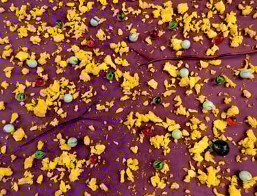 Splintered Blog 8; scrambled eggs, marbles and frayed wires on a purple background