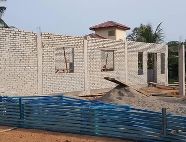 Suasana Renovations constructing new brick house structure and interior work.