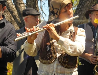 Founder of Mazel Tov Kocktail Hour, Sam Goldberg, plays flute.