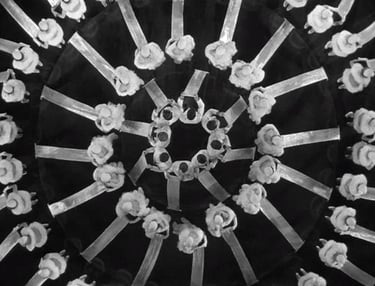 Busby Berkeley’s 42nd Street number “I’m Young and Healthy” – overhead view of dancers shaping swirl